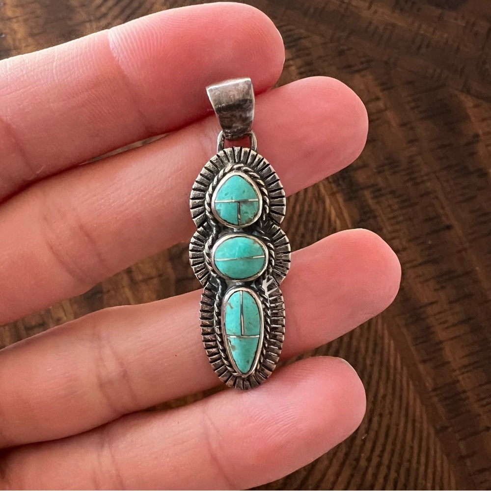 Genuine Turquoise and Silver Navajo pendant. Bright blue-green turquoise.
